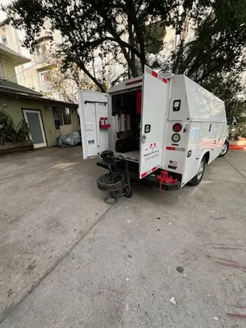 Magnet Plumbing service vehicle on-site for Grease Trap Cleaning in Lihue